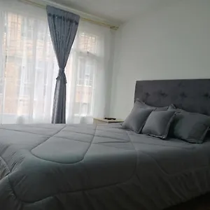 https://habitacin-privada-cerca-al-aeropuerto-y-terminal.hotels-bogota.net